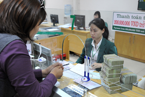 Những ngân hàng cỡ vừa tăng tốc trong năm 2010, trong khi đại gia đang chậm lại. Ảnh minh họa: Hoàng Hà